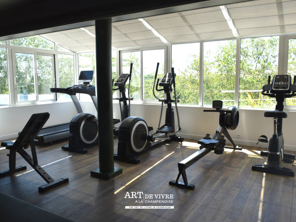 Salle de fitness avec vue sur le stade Auguste Delaune